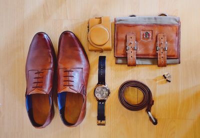 High angle view of clock on shoes