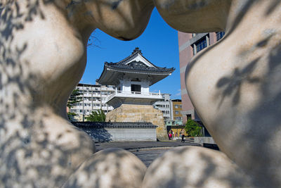 Exterior of historic building against sky in city