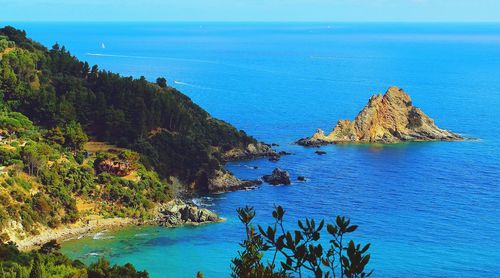 High angle view of sea against blue sky