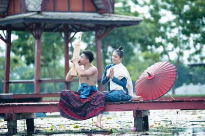 People sitting on bench