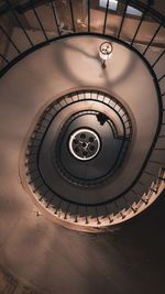 Directly below shot of spiral staircase in building