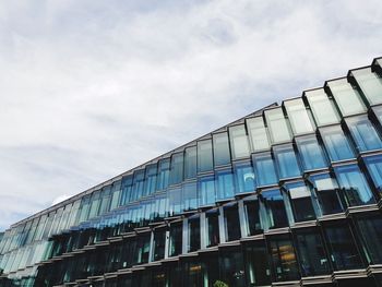 Low angle view of modern building against sky