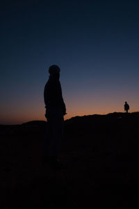 Silhouette of man at sunset