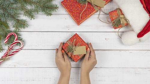 High angle view of woman with christmas decorations