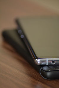 High angle view of mobile phone on table