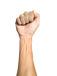 Close-up of human hand against white background