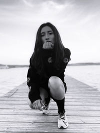 Portrait of young woman on menorca  beach. 