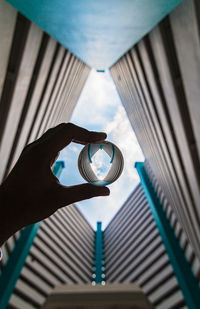 Close-up of hand holding crystal ball