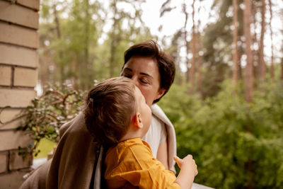 Happy grandmother and grandson enjoy time together. positive middle age woman 