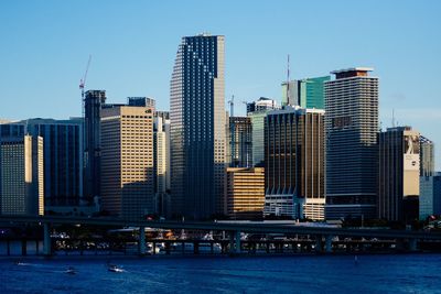 View of skyscrapers against blue sky