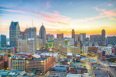 High angle view of buildings against sky during sunset