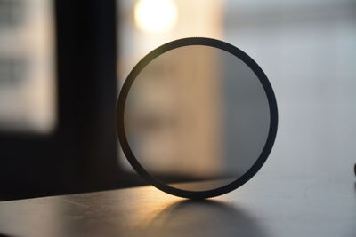 Close-up of electric lamp on table