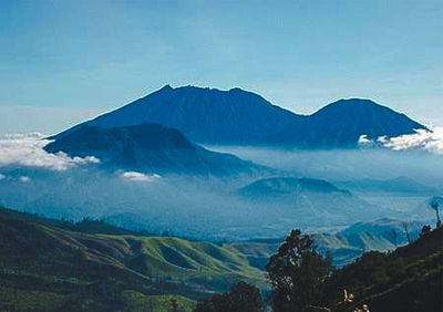View of volcanic mountain range against sky