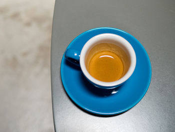 High angle view of coffee cup on table