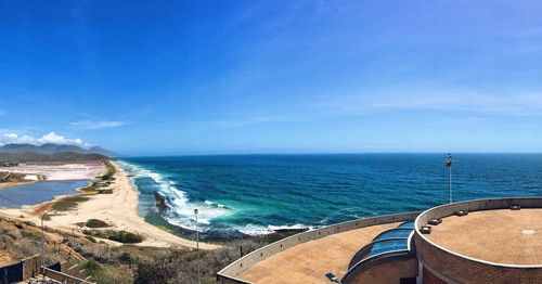 High angle view of sea against blue sky