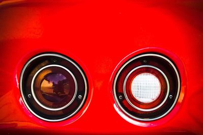 Close-up of red vintage car