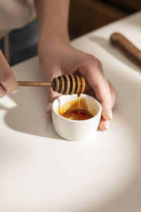 Small bowl of honey on a table