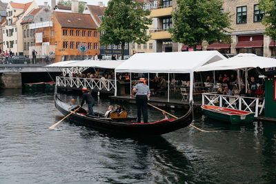 Boats moored in canal