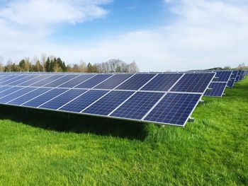 Solar panel on grassy field