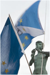 Low angle view of statue against clear blue sky