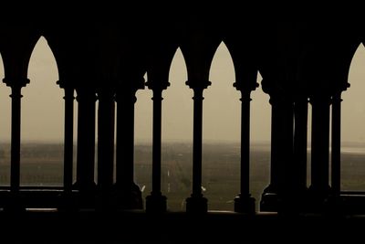 Silhouette of building against sky