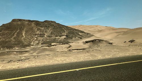 Scenic view of desert against sky