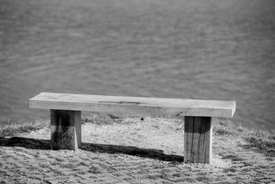 Wooden fence on field during winter