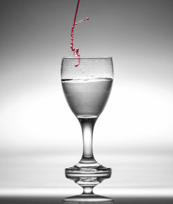 Close-up of wine glass on table