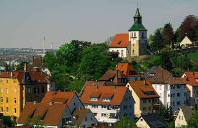 Buildings in city against sky