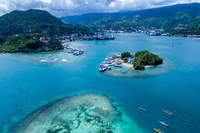 High angle view of boats on sea shore