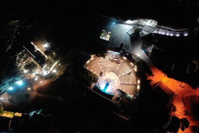 High angle view of illuminated carousel at night