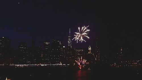 Firework display at night