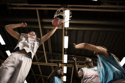 Playing basketball