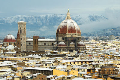 High angle view of cathedral against cloudy sky