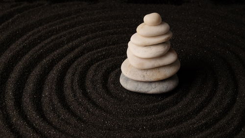 Close-up of ice cream on pebbles