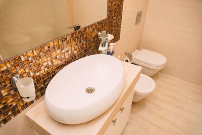 High angle view of faucet in bathroom at home