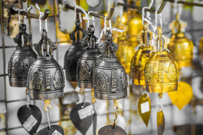 Close-up of decorations hanging at market stall