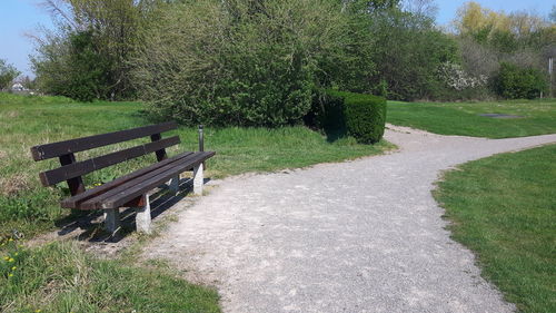 Empty bench in park