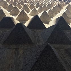 Low angle view of pyramid shapes on wall