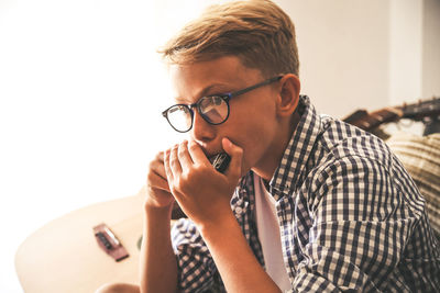 Portrait of man wearing eyeglasses