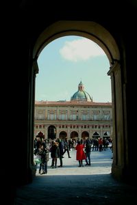 People in front of historical building