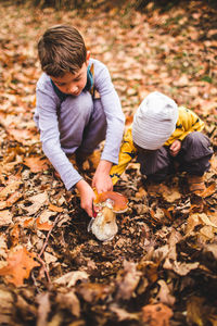 Full length of children on field during autumn