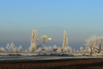 Panoramic view of desert against clear sky