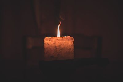 Close-up of burning candle