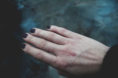 Close-up of cropped woman hand