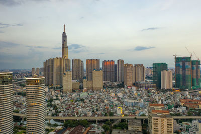 Modern buildings in city against sky