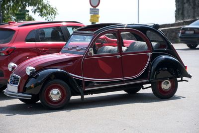 Vintage car parked on road