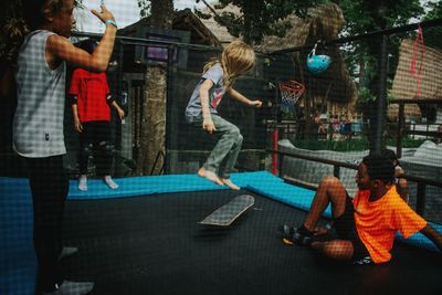 People playing in swimming pool