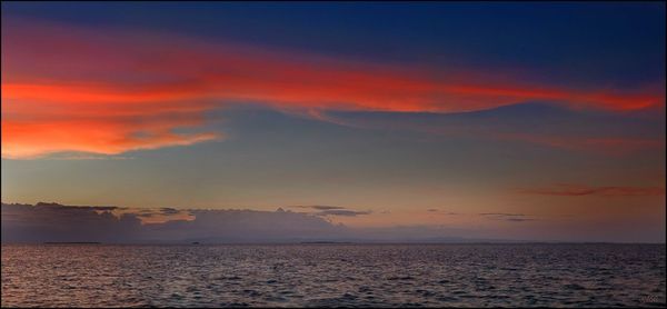 Scenic view of sea at sunset