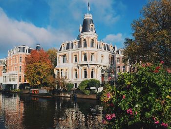 Amsterdam buildings against blue sky